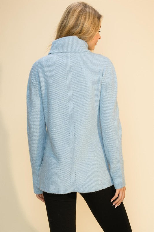 Suéter tono azul celeste